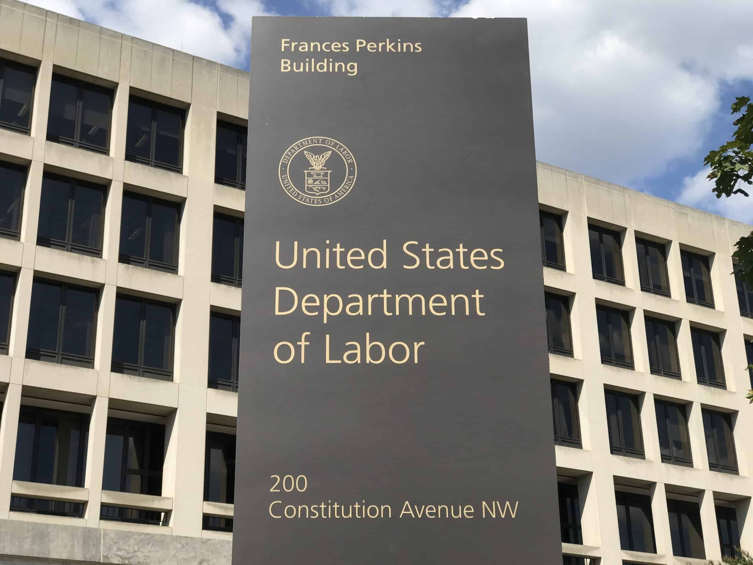 Washington DC USA , Sep 03 2019 : Labor sign and building.